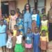 Dr Vera Beyuo distributes 500 free school uniforms to girls in Lambussie