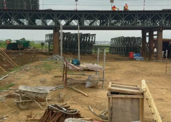 Oti Regional Minister inspects progress of Dambai bridge project