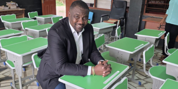 John Dumelo donates school desks to Roman Ridge M/A Basic school