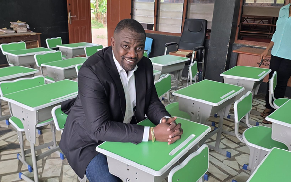 John Dumelo donates school desks to Roman Ridge M/A Basic school
