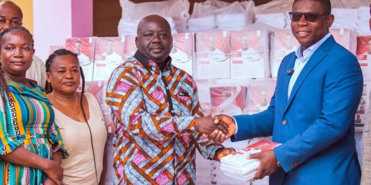 MP donates 70,000 exercise books to schools in Gomoa West